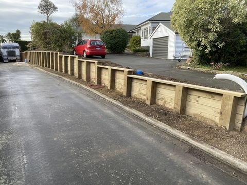 Square timber pole retaining wall in Cashmere Christchurch