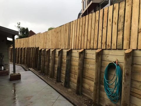 Timber pole retaining wall in Lyttelton Christchurch